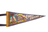 Vintage Coney Island felt pennant detail: colorful Parachute Jump graphic and yellow binding.