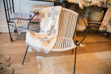 Soft, reversible gray and white Swiss Cross throw with bold geometric design.