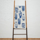 Delft Blue blanket with blue and white porcelain vase pattern, 50x60 inches.