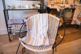 Eco-Friendly blue and white blanket with woven texture and striped herringbone pattern.