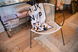 ABC Kids Blanket draped, revealing black and gray alphabet letters with a heart.