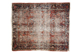 Fine Lilihan hand-knotted rug, brick red field, faded medallion, and navy scrolling vinery, 5'3