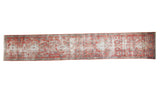Antique Persian Heriz runner with a single column of medallions in a blush, red, and blue Herati design.