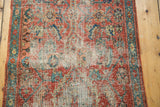 Mostly even wear across knot heads reveals the foundation of this antique Heriz runner.