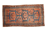 Vintage Fine Hamadan rug with triple blue shadow medallions on a brick red field.