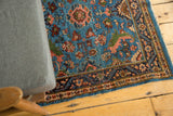 A vintage Engelas rug shown in-home, highlighting its plush texture and detailed floral design.