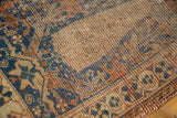 Antique Persian Afshar rug showing faded sky blue, terra cotta geometric motifs, mostly even wear.