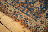 Antique Afshar rug border in sky blue and madder red, with geometric motifs and light selvage tatter.