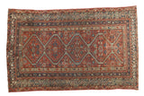 Antique Persian Mission Malayer rug, terra cotta geometric medallions, and distinct plant motifs.