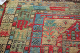 Detailed view of geometric stylized flowers with knot heads in red, blue, and beige tones.