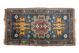 Vintage Russian rug runner showcasing geometric triple medallions, dark blue, saffron yellow, and copper patterns.