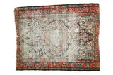 Vintage Dargezine square rug with worn navy floral medallion and brick red border.