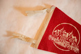 Vintage Northfield felt pennant with off-white header and knotted felt ties.