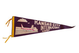 Vintage Kansas City International Airport felt pennant, dark purple with plane and airport graphic.