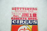 Bold red and blue typography showing the event details on the vintage circus poster.
