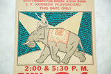 Upper left detail of vintage Wild West circus poster, red banner and elephant performer.