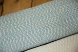 Woven texture of the organic cotton baby blue rag rug with a subtle chevron design.