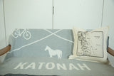 Katonah map pillow styled with a coordinating grey and white Katonah throw blanket.