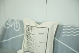 Katonah NY map pillow styled with a modern grey and white graphic throw blanket.