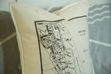 Close-up of the Katonah map pillow corner showing the crisp black print on woven cotton.