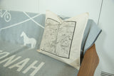 Angled view of the off-white cotton pillow with its antique Katonah map design.