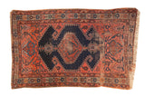Antique Fine Malayer rug with navy diamond medallion, faded red field, rams horn, and vinery, 4x6.