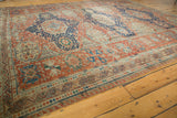 Madder root red field and navy geometric patterns on a late 19th century Caucasian Soumac border.