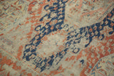 Antique Caucasian Soumac rug detail: worn foundation, faded navy, madder red geometric patterns.