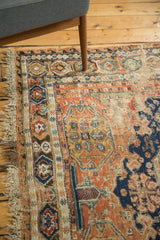 Antique Caucasian Soumac carpet: geometric madder red, sky blue, gold patterns, with visible foundation.