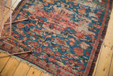 Antique Karabagh Soumac corner, with tattered fringe and Caucasian wave border in mallard green and dusty rose.