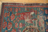 Antique Karabagh Soumac rug detail: red fox, mallard green field, exposed foundation, macrame.