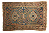 Vintage Caucasian rug, geometric double medallion, crab-style contouring, navy blue, copper, beige.