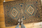 Vintage Caucasian rug with geometric serrated outlines and running 