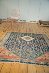 Antique Persian Fine Meshed fragment, intricate navy Herati field, terracotta corner with abrash.