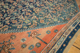 Intricate Herati design in navy and teal, transitioning to terra cotta spandrel with abrashes.