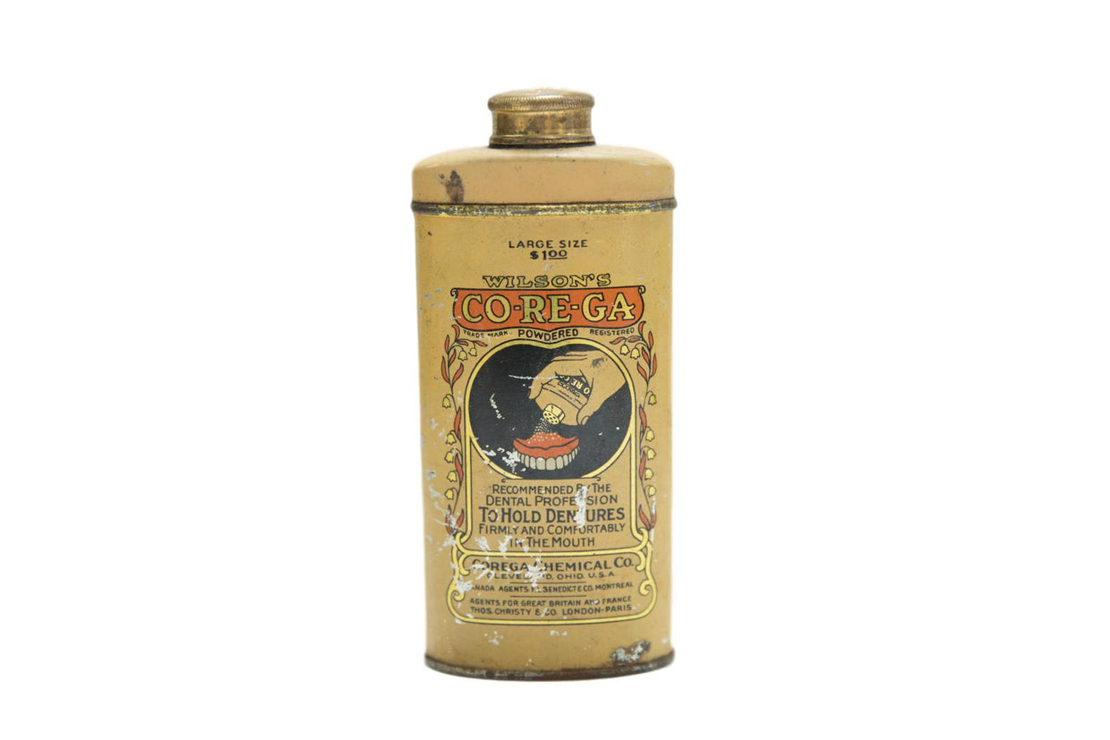 Antique Corega Dental Tin, golden with aged patina and illustrative red-and-black label.