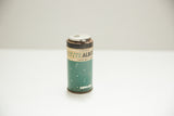 Vintage Albodon Dental Tin, angled view showing aged green, white, and rust details.