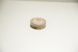 Antique Eycryl Snake Dental Tin with red and white circular lid graphics and snake motif.