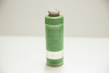 Vintage green Supreme Dental Powder Tin showing full label and silver cap.