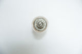 Embossed Colgate & Co. New York on the antique glass jar's original metal lid.