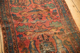 Professionally seamed vintage Lilihan rug fragment displaying worn red, blue, green arabesques.