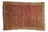 Antique Karabagh rug, dusty mauve field, allover boteh lattice, moss, blue, barber pole border.