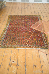 Early 20th century Karabagh rug, dusty mauve allover boteh lattice, barber pole border.