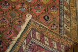 Antique Karabagh rug's original secured fringe and tight hand-knotted foundation.