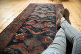 Asymmetric reptile, finned floral motifs on Mehreban runner in indigo, madder, copper, green.
