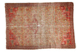 Antique Zuli Sultan rug: red diamond medallion, saffron chained floral lattice, visible wear.