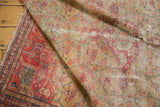 Worn saffron yellow gold field of antique Zuli Sultan rug, revealing floral lattice, and scattered holes.