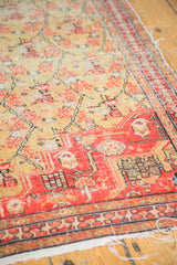 Antique Zuli Sultan rug detail: worn saffron gold chained lattice and red floral panels with tattered edges.