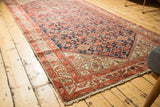Vintage Malayer runner's navy and madder red Herati motif with beige vine border.