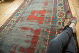 Authentic antique Kazak rug texture, showing recessed pile to cherry red foundation and sky blue.